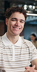 Happy, professional and face of businessman in office with confidence for career in web development. Smile, about us and portrait of software engineer with pride for job opportunity in workplace.