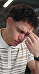 Businessman, headache and stress with eye strain in office for overworked pressure or deadline. Frustrated, man or employee with migraine or discomfort for pain, fatigue or burnout in workplace