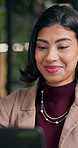 Happy, woman and lawyer in office with laptop, research and online evidence for court case. Smile, attorney and reading at law firm with pc, witness statement and confidential records for proceedings