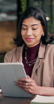 Smile, woman and lawyer in office with tablet, research and online evidence for court case. Happy, attorney and reading at law firm with digital, witness statement and legal records for proceedings
