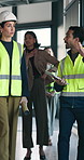 Engineer, inspection and people with tablet, walk or planning for project with research in building. Civil engineering, supervisor and colleagues with technology, pointing and property development