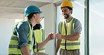 Construction, happy and men in building with fist bump for good job, renovation and site progress. Contractor, architecture and people with success for remodeling, support and infrastructure project