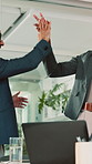 Happy, laptop and business people with high five for winning, teamwork or success in office. Excited, group or employees with smile or computer for achievement, promotion or good news in workplace