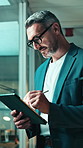 Window, tablet and business man with pen for research, financial planning and risk assessment. Office, stylus and mature person on tech for investment, finance report and strategy for budget proposal