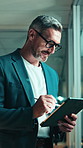Business, happy and man with tablet, glasses and pen for research, financial planning and budget. Office, glass and mature person on tech with stylus for investment, finance report or risk assessment