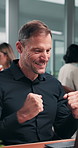 Businessman, financial advisor and fist pump with laptop, celebration and good news for promotion. Mature person, accountant and coworking with tech for consultation, success or goal with policy