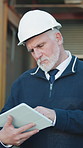 Tablet, man and supply chain in warehouse with scroll, research and logistics for shipping. Serious, mature person or review in depot with tech, schedule dispatch and inventory for stock distribution