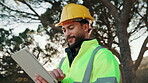 Architecture, building and tablet with man outdoor on construction site for property development. App, project management and worksite inspection with happy engineer in nature for quality control
