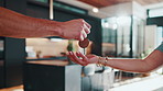 Hands, keys and realtor in new home with sale, mortgage or deal with moving for property investment. People, customer and real estate agent with service for agreement, rent or relocation in apartment