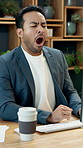Tired, businessman and yawn with coffee in office for caffeine, energy or unproductive day. Lazy, man or exhausted employee with fatigue, drink or beverage for burnout, recovery or boost in workplace