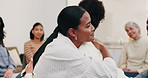 Therapy, group or women in center with hug, understanding or peer empathy in emotional support. Mental health, patient or people with in clinic embrace, encouragement or coping together in counseling