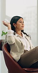 Business, woman and playing with paper ball in office for free time, boredom or break on chair. Playful, female person or throwing game in workplace for procrastination, lazy or unproductive day