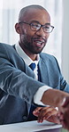 Financial advisor, handshake and man with smile in meeting, talk or investment opportunity in office. Eyewear, reflection and black person with client, shaking hands and happy for wealth management