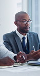 Business, team and men with laptop in meeting, talking and budget review on web or financial report. Office, discussion and black people with ideas, wealth management  collaboration with technology