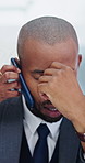 Stress, phone call and black man with headache in office for multitask, deadline or project mistake. Migraine, overwhelmed and corporate manager with mobile discussion, documents or busy schedule.