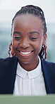 Black woman, laptop and happy with smile in office for review, solution and budget at company. Person, accountant and technology for feedback, report and investment portfolio at financial agency