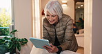 Happy, tablet and senior woman in retirement home with reading blog on app for pension planning. Smile, research and elderly person with technology for online article with newsletter subscription.