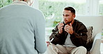 Consulting, psychology and man in conversation with therapist for advice, healing or healthcare. Explain, mental health and professional therapy with people in clinic for ptsd or trauma counselling