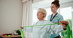 Physiotherapy, exercise and senior woman with resistance band, physiotherapist and talking for advice. Physio, healthcare and wellness with old patient at clinic for stretching, muscle and injury