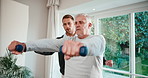 Physiotherapy, exercise and senior man with dumbbells, physiotherapist and talking for advice. Physio, healthcare and wellness with old patient at clinic for weights, muscle and rehabilitation
