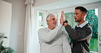 Physiotherapy, high five and senior man with dumbbells, physiotherapist and talking for advice. Physio, success and wellness with old patient at clinic for weights, muscle and rehabilitation
