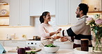 Dancing, smile and couple in kitchen at house listening to music, playlist or radio together. Happy, love and man with woman for moving to song for bonding, care and connection in home on weekend.
