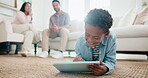 Smile, child and relax on floor with tablet, internet search and download games for education. Happy, parents and kid at house with digital gaming, browsing website and online video for e learning 