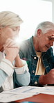 Documents, stress and senior couple in home with planning for retirement funds or debt. Paperwork, discussion and elderly people with finance report for expenses, pension or asset management.