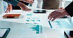 Meeting, charts and documents in office with business people for company profit, revenue and pitch. Paperwork, graphs and financial manager with team for investment discussion, budget or planning