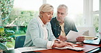 Mature, couple or calculator with finance in home for investment audit, expenses or bills together. Man, woman or calculation with lens flare, paperwork or financial report for tax deduction in house