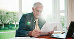 Mature, man and documents with laptop in home for financial stress, inflation or over budget. Male person, debt or paperwork with computer or expenses for finance crisis, bad news or mistake in house