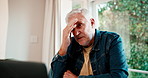 Home office, financial crisis and man with laptop, thinking or accountant with stress after mistake. Remote work, bookkeeping and mature person with tech, decision fatigue and tax burnout in house