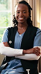 Face, black woman and caregiver at house with smile, career pride and about us for medical advice. Portrait, female nurse and happy in home with arms crossed, positive attitude and healthcare service