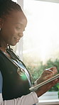 Happy, home and nurse on tablet for medical service, research or support for healthcare career. Flare, smile and black woman on tech for health report, treatment plan or schedule for assisted living