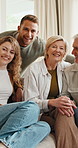 Big family, face and smile on sofa with love, support and bonding in living room of home to relax. Generations, senior parents and adult son with happy, portrait and couch in lounge for relationship