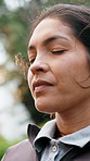 Calm, woman and breathing exercise in nature for spiritual wellness, outdoor healing or fresh air. Zen, female person or awareness with lens flare or eyes closed for health or mindfulness in park