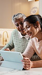 Cooking, tablet and elderly mom with woman for bonding with meal prep, lunch and supper. Happy, home and senior parent with adult daughter on tech for recipe, connection and talking in kitchen