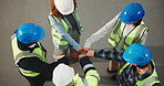 Above, construction and team circle with fist bump for support, motivation and solidarity at job site. People, engineering group and huddle with hands together for unity, workforce goals and trust