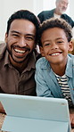 Tablet, relax and face of father with child in home for watching movie, series or film together. Happy, digital technology and portrait of dad with boy kid for streaming show on app subscription.