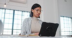 Creative, typing and woman with laptop in office, graphic designer or editing assignment on website. Employee, online and person with tech for brand identity, research and design project in business