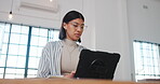 Creative, online and woman with laptop in office, graphic designer or editing assignment on website. Employee, typing and person with tech for brand identity, research and design project in business