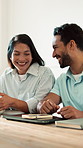 Technology, laughing and happy couple in home for funny joke, humor or network connection. Man, woman or smile with phone, tablet or coffee for comedy, bonding or social media together in house