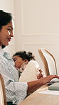 Mom, baby and freelancer with laptop in home for parenthood, comfort or kiss with affection. Mother, remote work or computer with smile, child or kid for love, growth or development together in house