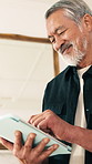 Happy, thinking and senior man with tablet in home with research, communication or reading blog. Smile, tech and elderly person in retirement with online article on pension planning in apartment.