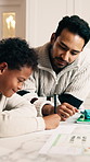 Home, help and dad with child for homework, learning assignment and answer for development. Family, happy and father with boy for education, teaching and support for knowledge with assessment