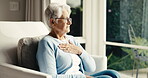 Senior, woman and thinking in home with chest pain, acid reflux or heart attack symptoms of angina. Retirement, old person or discomfort on sofa for heartburn, lung infection or respiratory condition