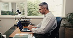 Typing, laptop or business man in home office for finance report, research or investment review. Remote work, wfh and mature person on computer for financial proposal, budget planning or online audit