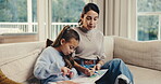 Child, education and coloring with mom in home, dancing or helping daughter with homework in lounge. Creative, family and mature woman with girl, growth and cognitive development with book in house