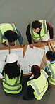 Above, construction site and people with blueprint for discussion, strategy or collaboration. Team, building progress or floor plan with timelapse for property development, renovation or productivity