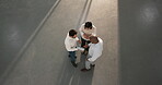 Business people, above and tablet for discussion with space, teamwork and data analysis for project. Collaboration, technology or screen with pitch meeting, graph info and employees with talking